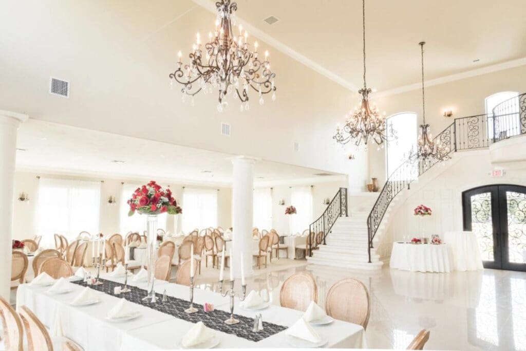 Elegant wedding reception venue with chandeliers.